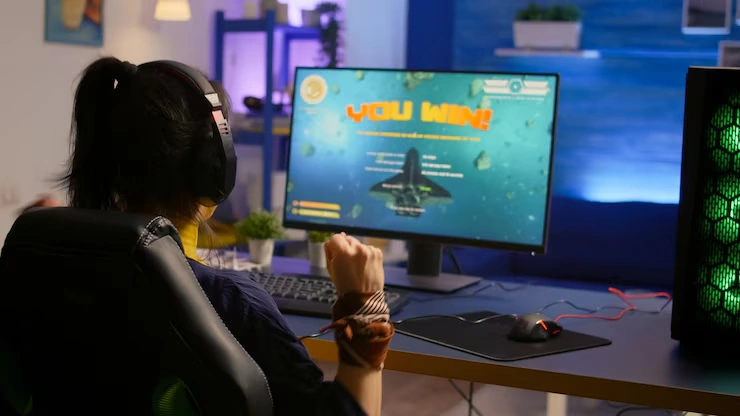 Game Marketing Services in Canada show a gamer celebrating a victory screen