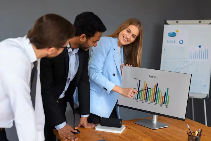 Unity Game Development Agency in Canada Businessperson analyzing finance graphs in a modern office setting.