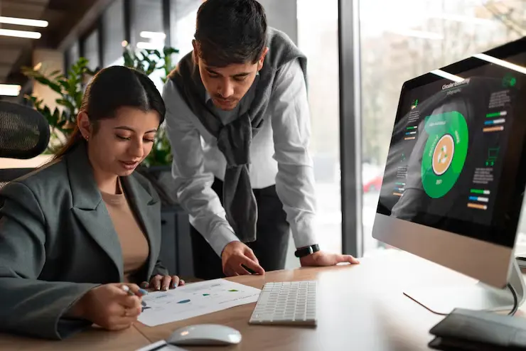 Mobile Game Development Agency in Canada professionals reviewing financial data for game projects